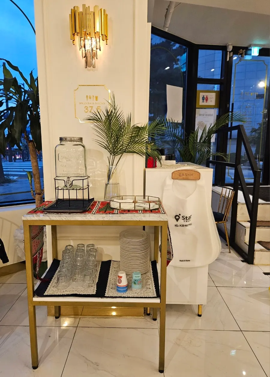 Counter area with aprons and water