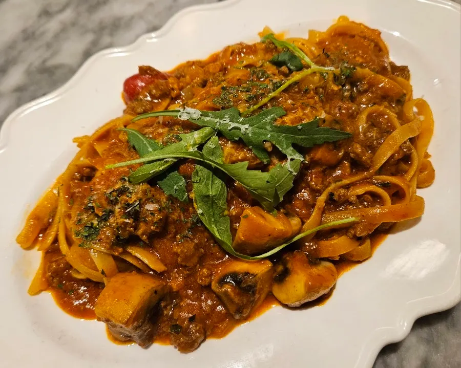 Ragu pasta with beef, mushrooms, and cherry tomatoes