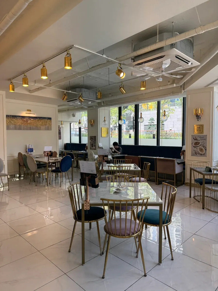 White-and-gold restaurant interior