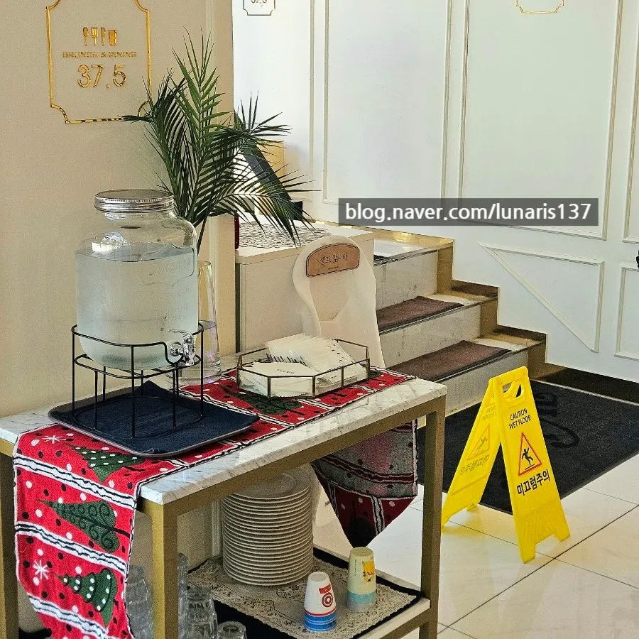 Self-service corner with water, wet wipes, and aprons
