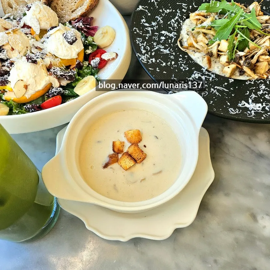 Table scene while sharing the salad