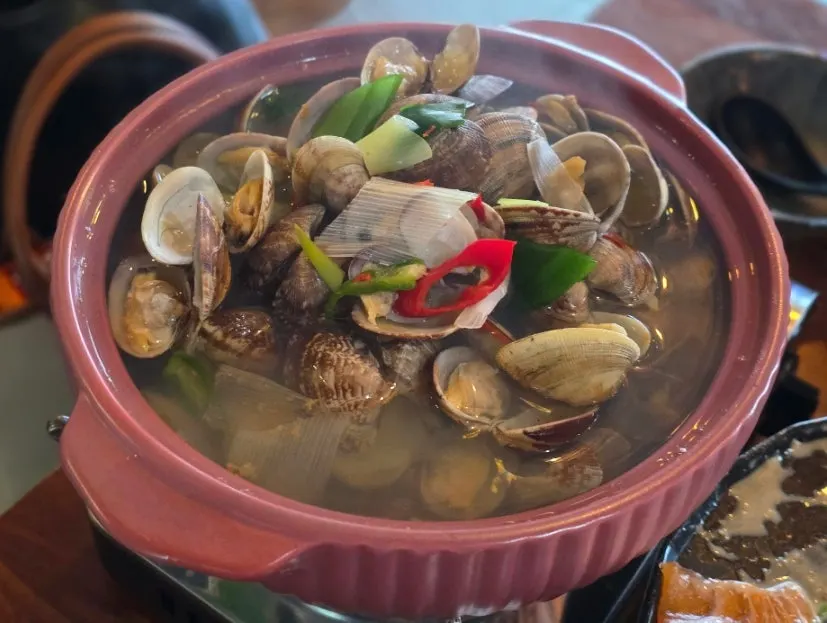 Byeolbit Cheongha enjoyed with the salmon sashimi