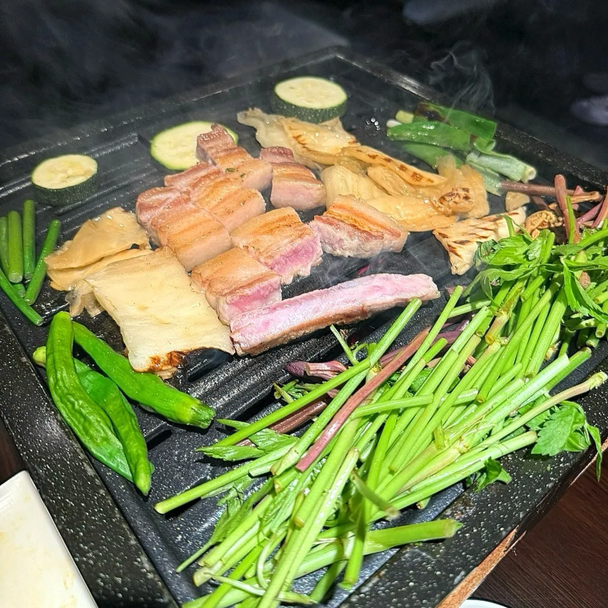 Signature samgyeopsal table spread at Giun Gangnam Station Main Branch