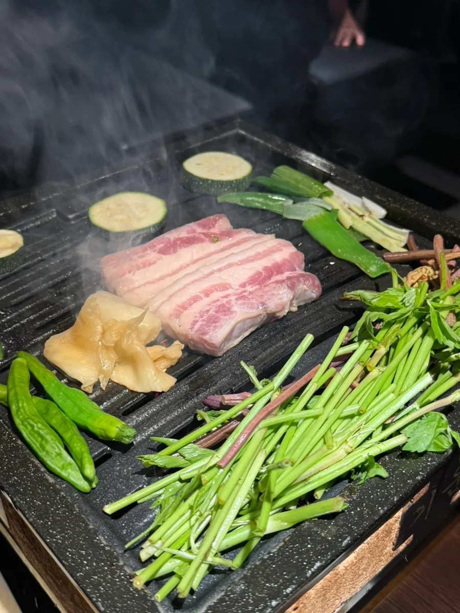 Special ochre clay charcoal grill with cast-iron plate