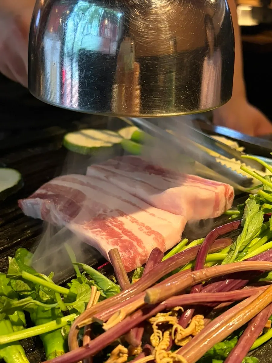 Plate of raw galbi-samgyeop, pork neck, and outer skirt meat