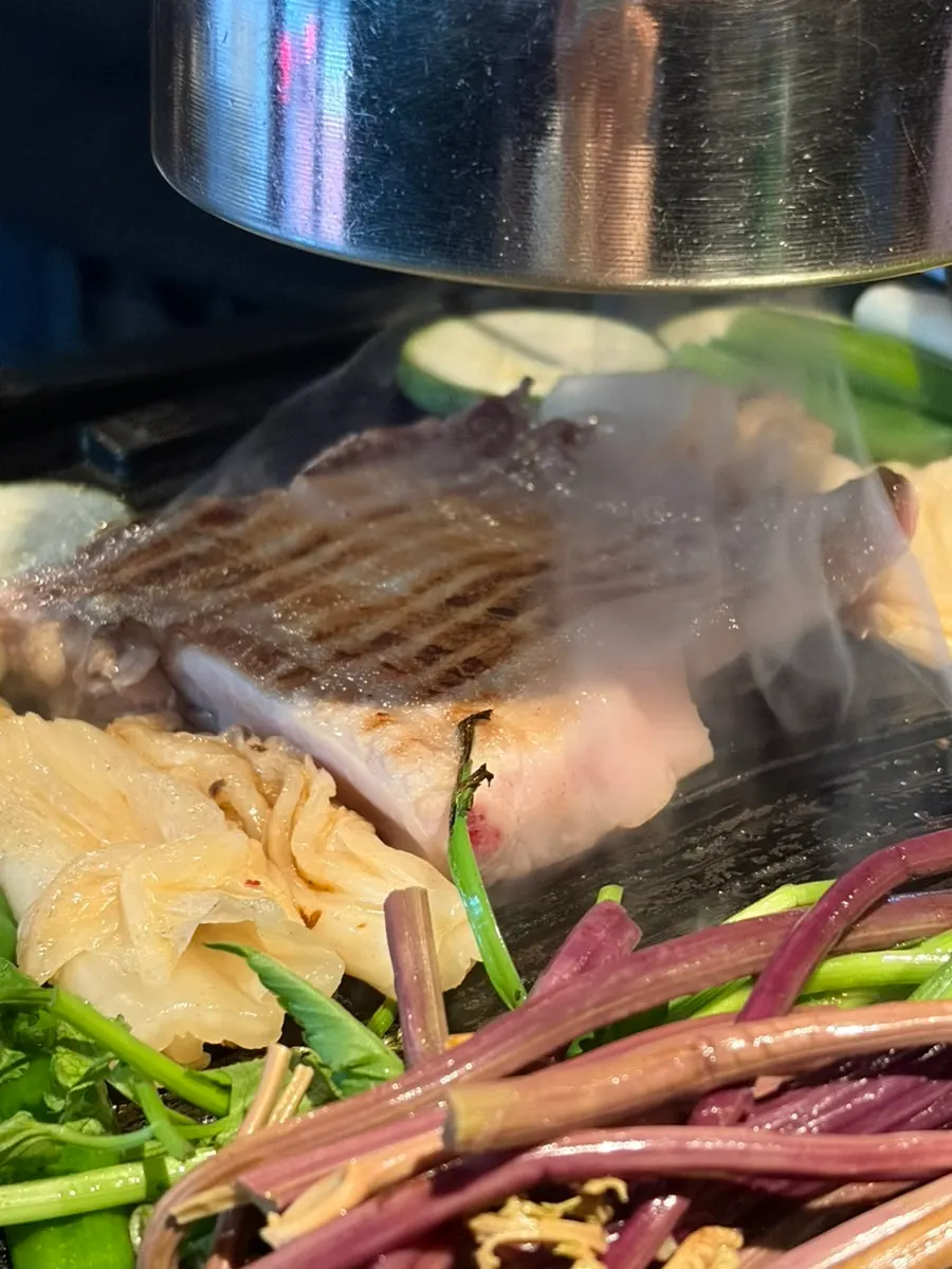 Galbi-samgyeop placed on the grill to start cooking