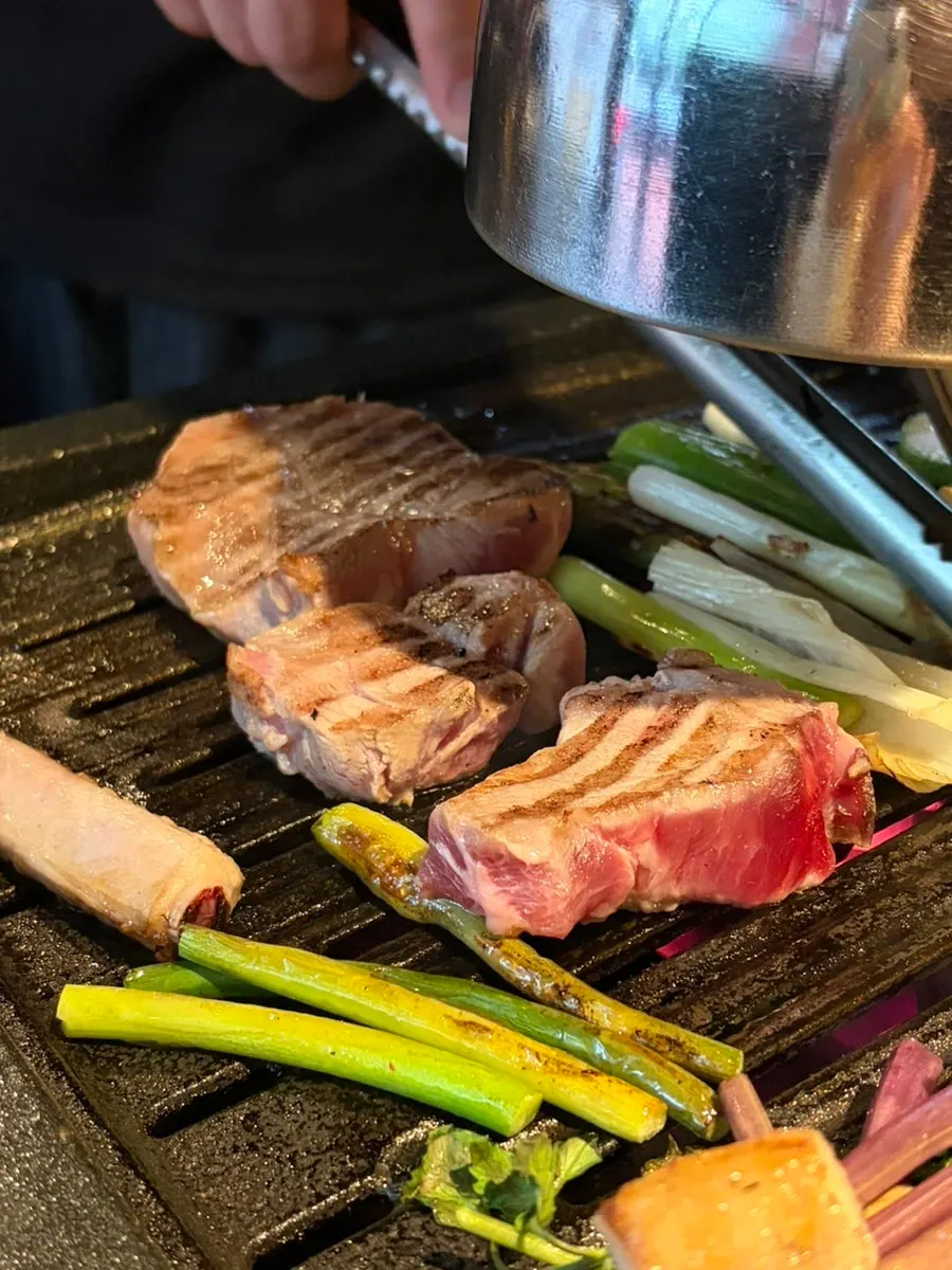 Meat wrapped in baek-kimchi for a single bite