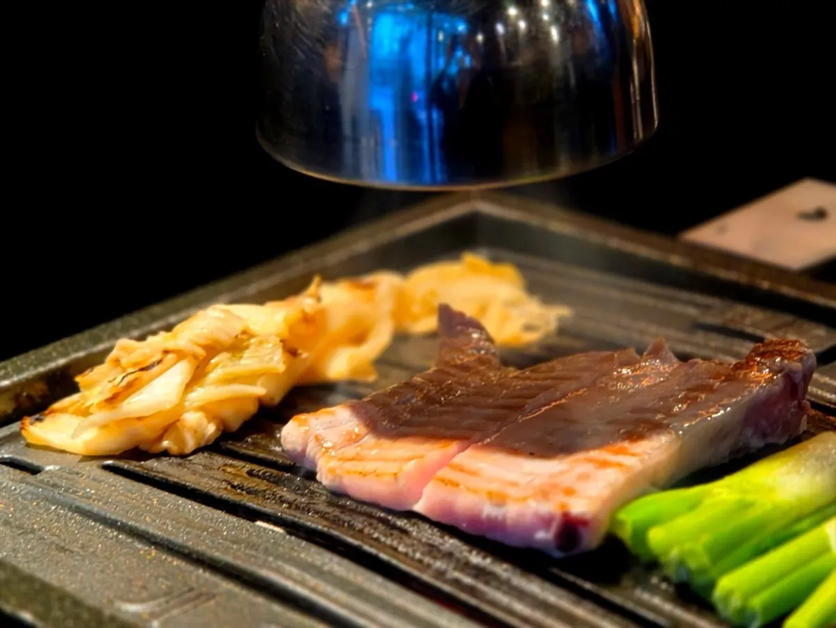 Grilled galbi samgyeopsal served with side dishes