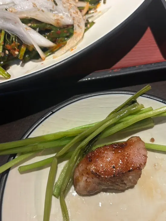 Vegetables grilled while soaking up meat fat