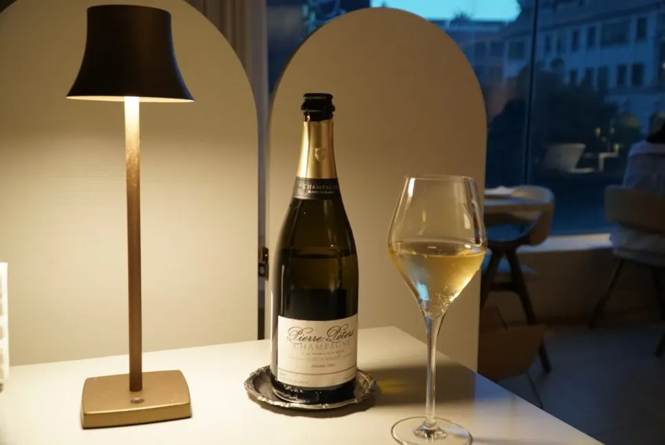 Champagne bottle and glasses on the table