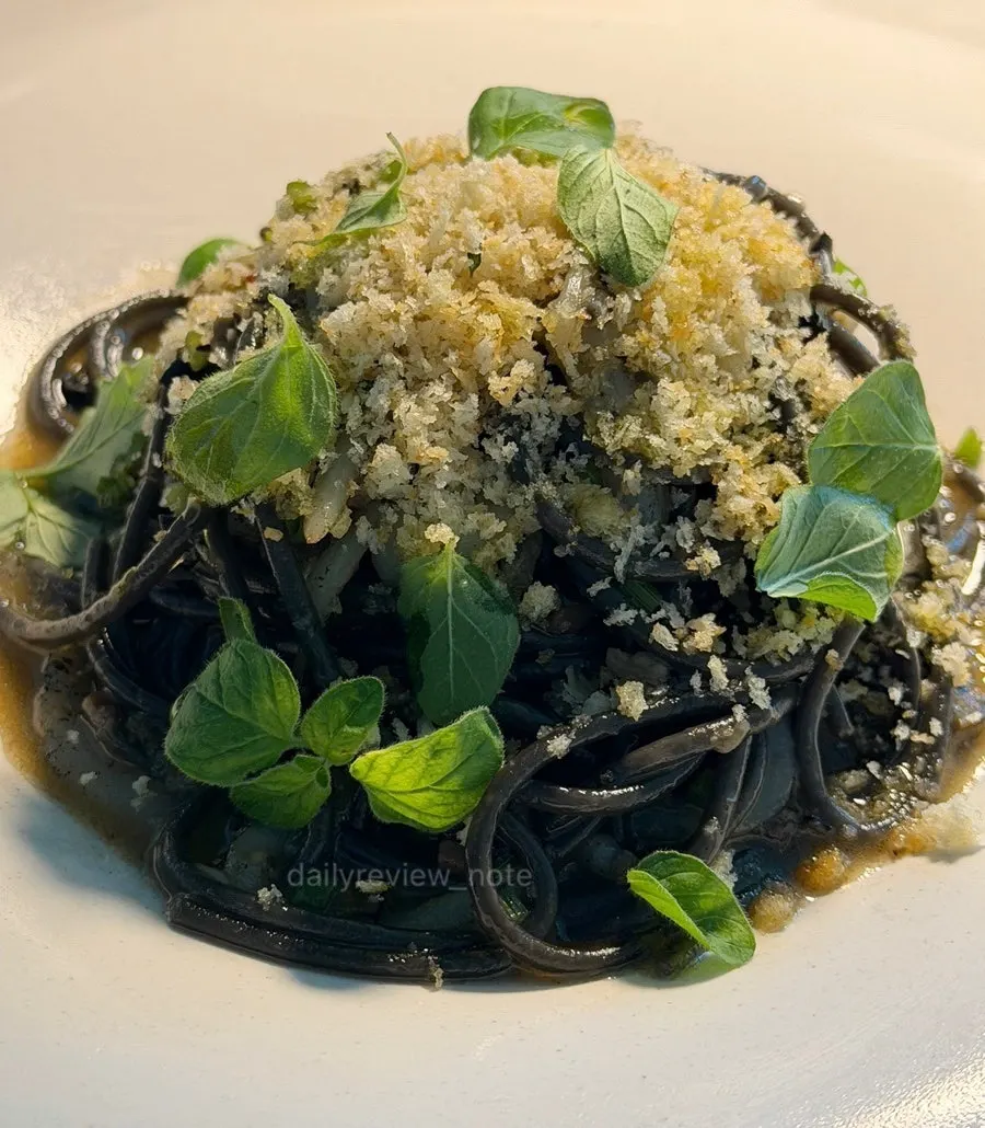 Cuttlefish tapenade pasta with black noodles