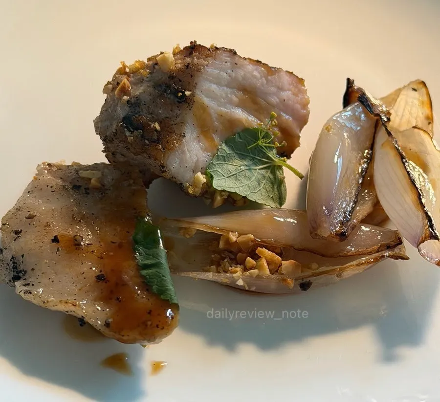 Jjondeuksal served with roasted onions and nuts