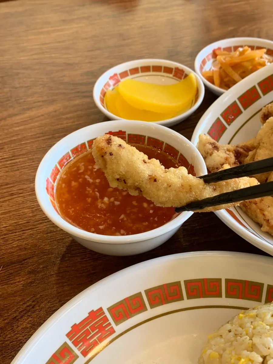 Tangsuyuk sauce served separately in a small dish