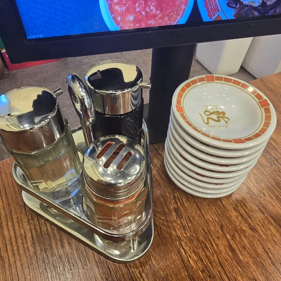 Basic setup of vinegar, chili powder, and soy sauce