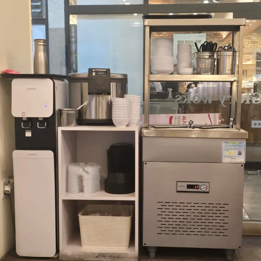 Self-serve bar with water dispenser and rice