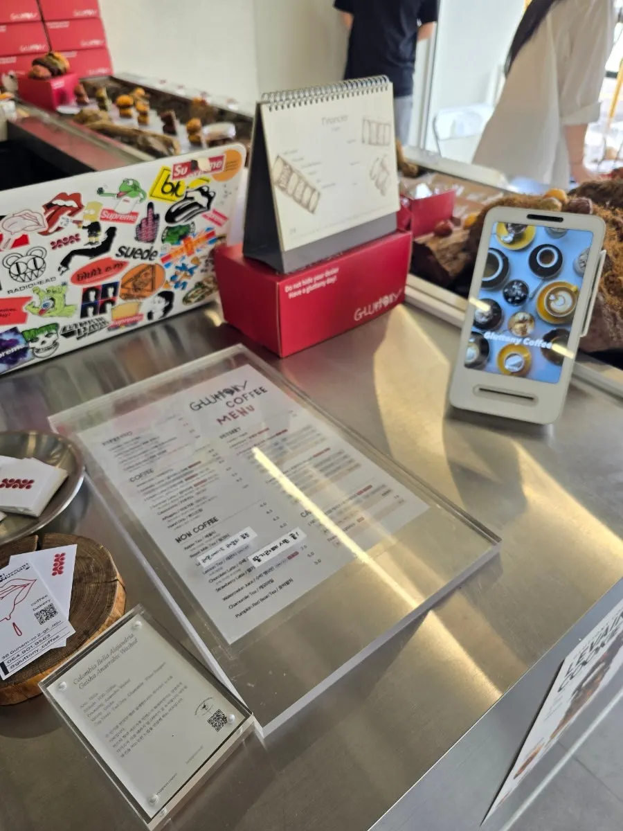 Gluttony Coffee's menu board