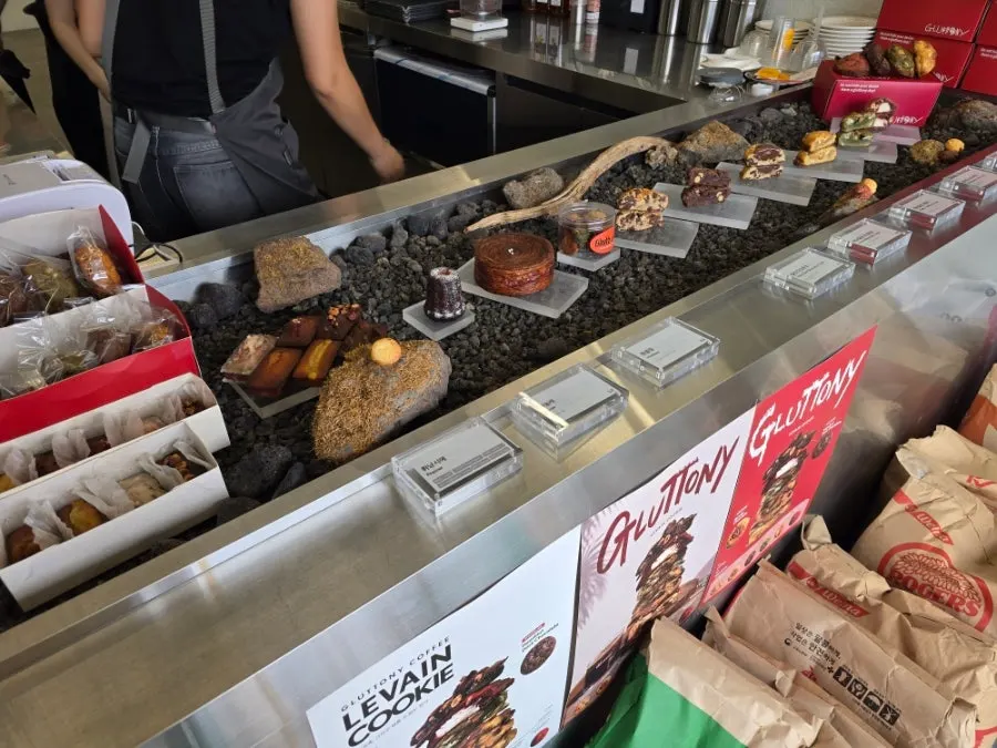 Display case of Gluttony Coffee desserts