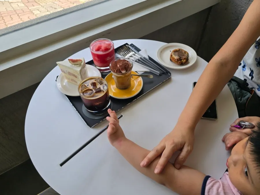 Drinks and dessert by the window seat