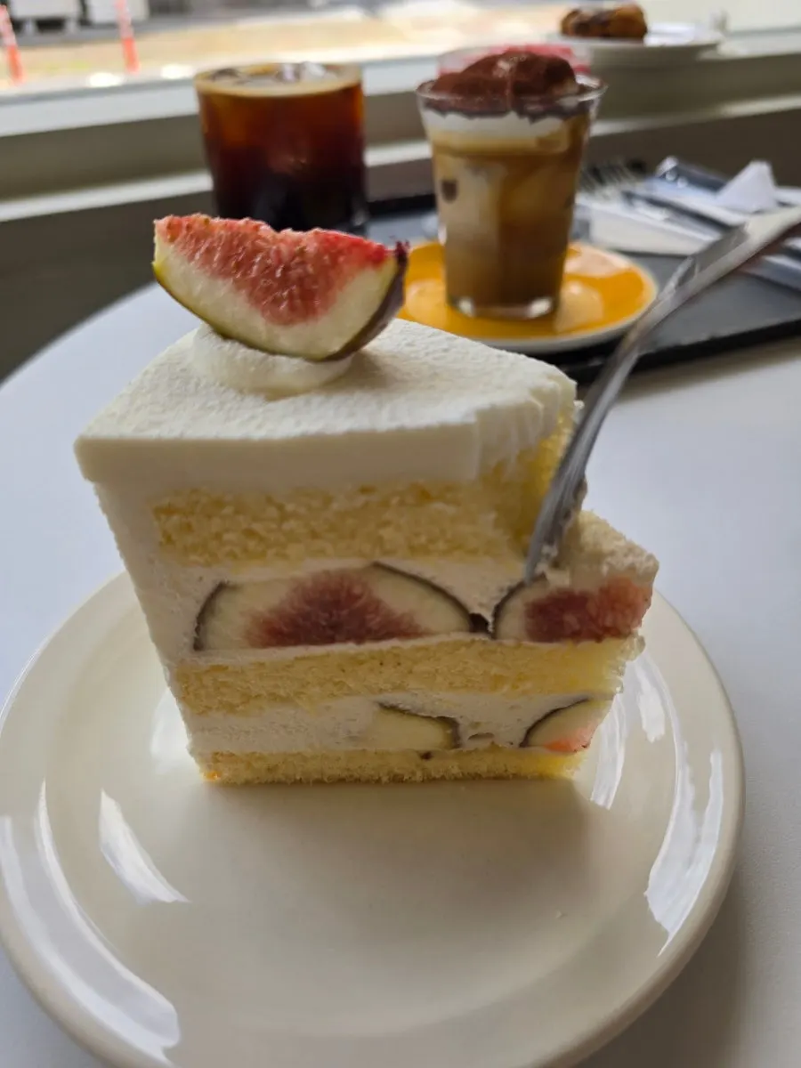 Slice cake topped with seasonal figs