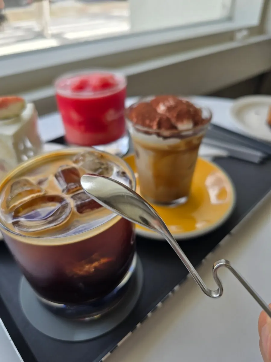 Unique spoon that clips onto the coffee cup