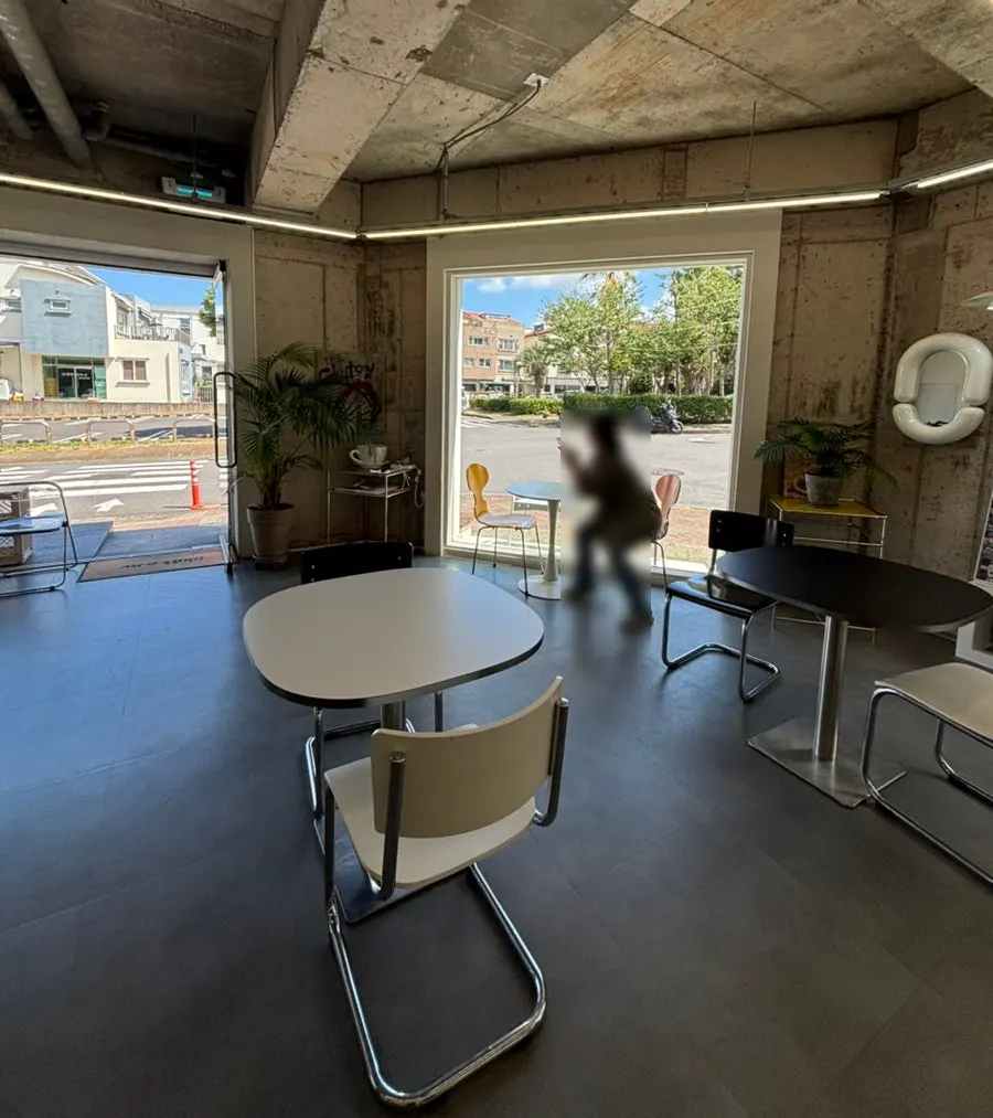 Seating and interior at Gluttony Coffee