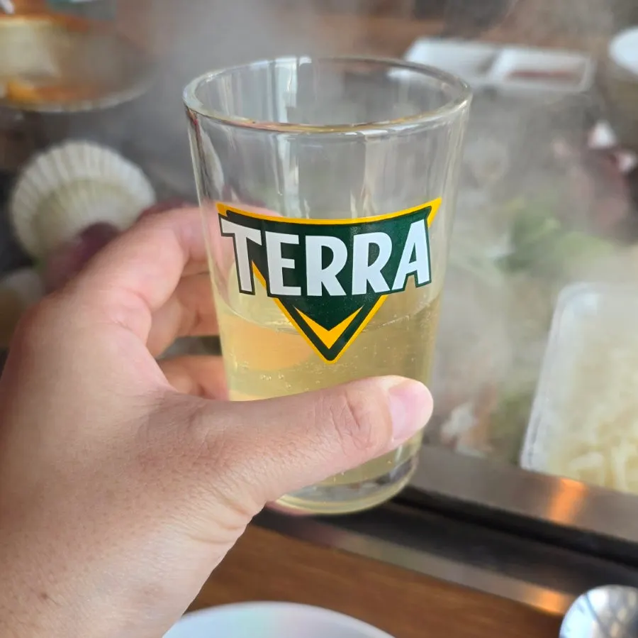 Bowl of refreshing steamed clam broth