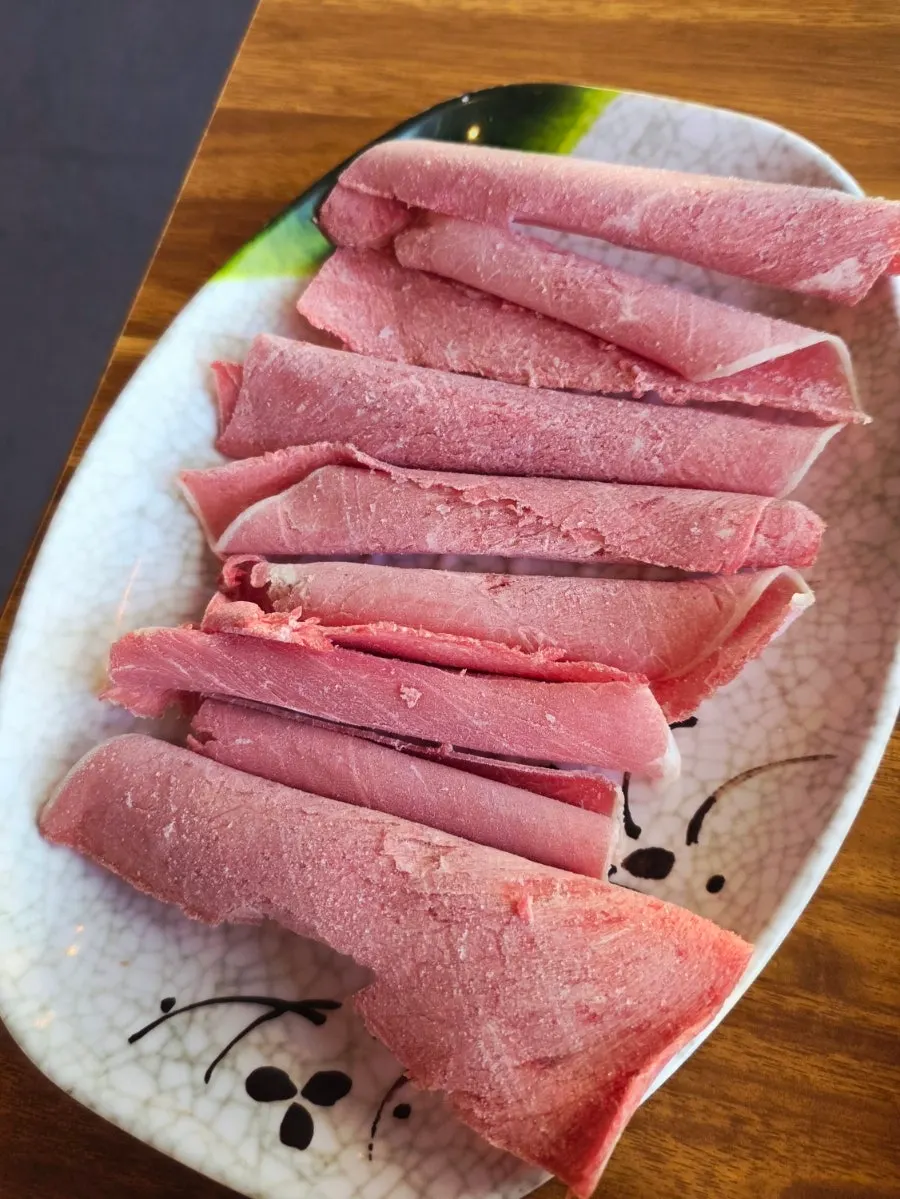 Shabu-style meat served with the steamed clam soup