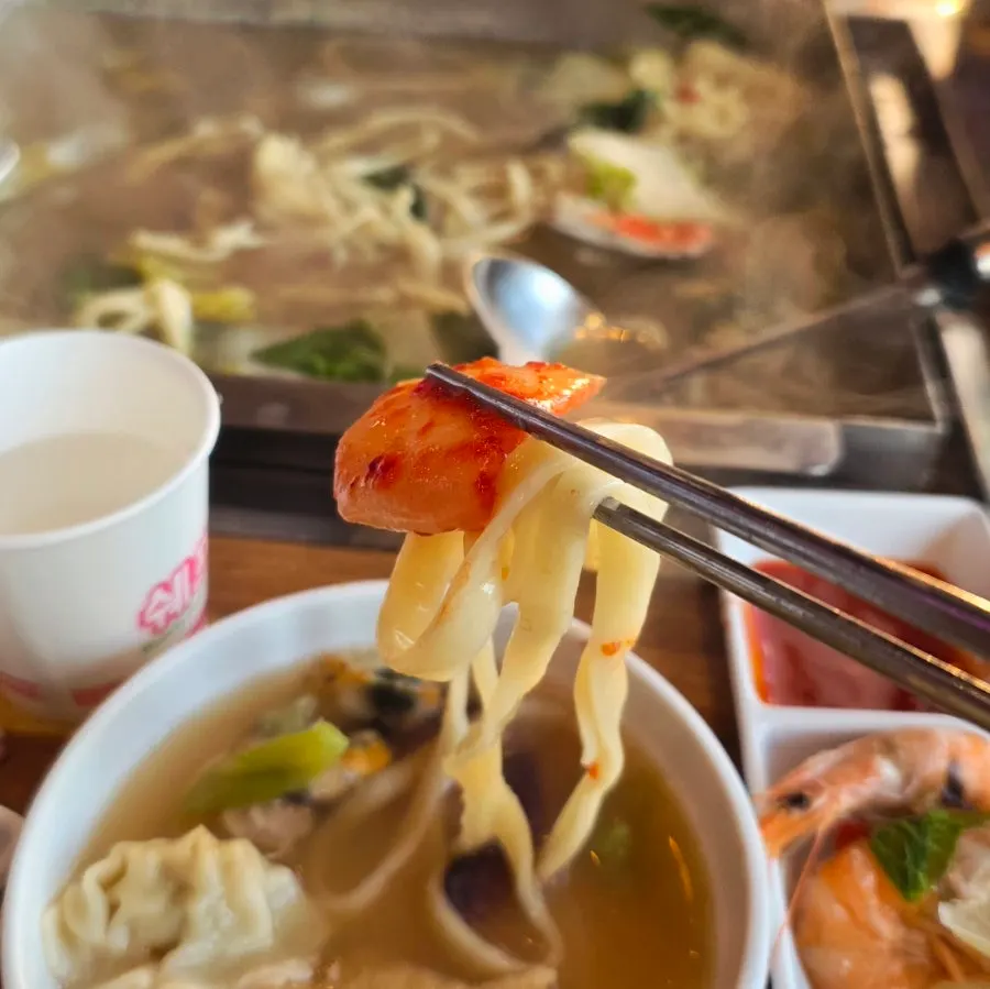 Kalguksu noodles paired with kimchi