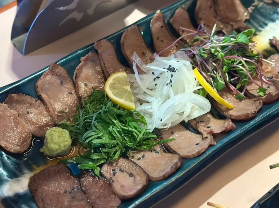 A plate of beef tongue tataki at Gobusi Nonhyeon Branch