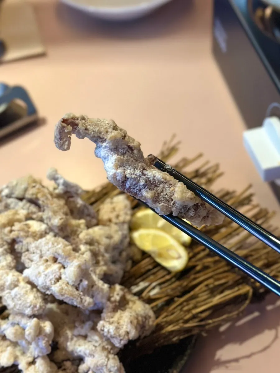 Large chicken skin fritters covered in seasoning