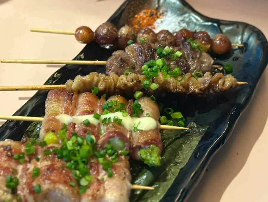 7-piece assorted skewer platter with heart, chicken skin, cheese bacon and more