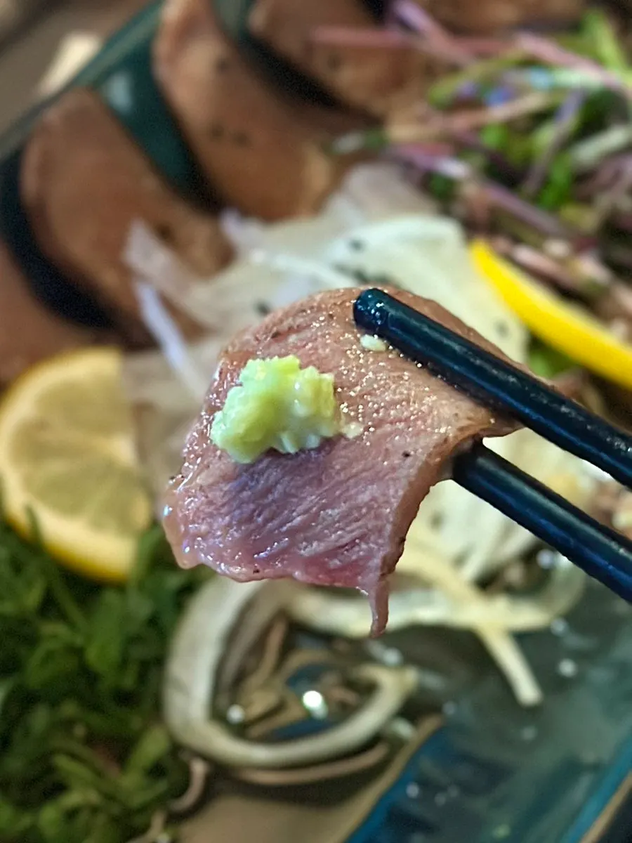 Beef tongue tataki topped with wasabi