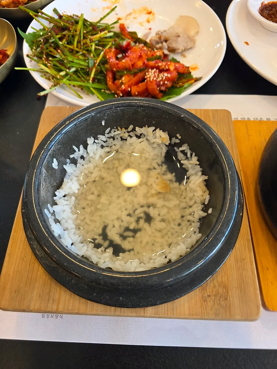 Glossy freshly steamed pot rice scooped out