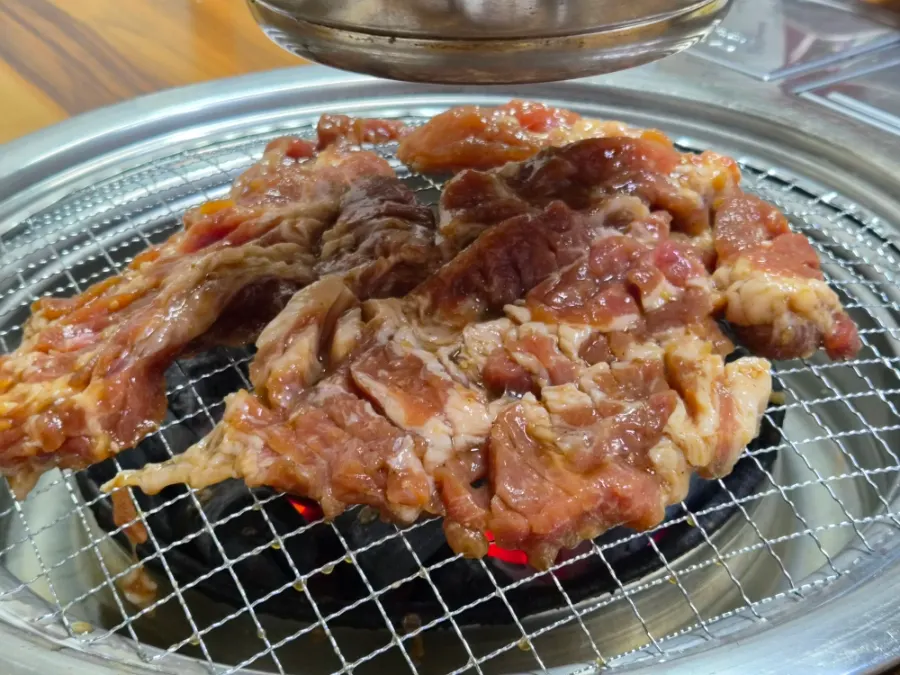 A full meal of charcoal ribs and side dishes
