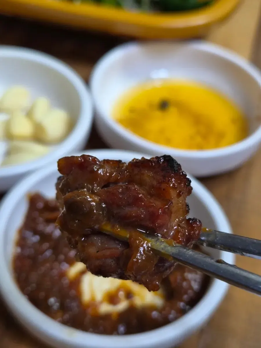 Table with side dishes and doenjang together