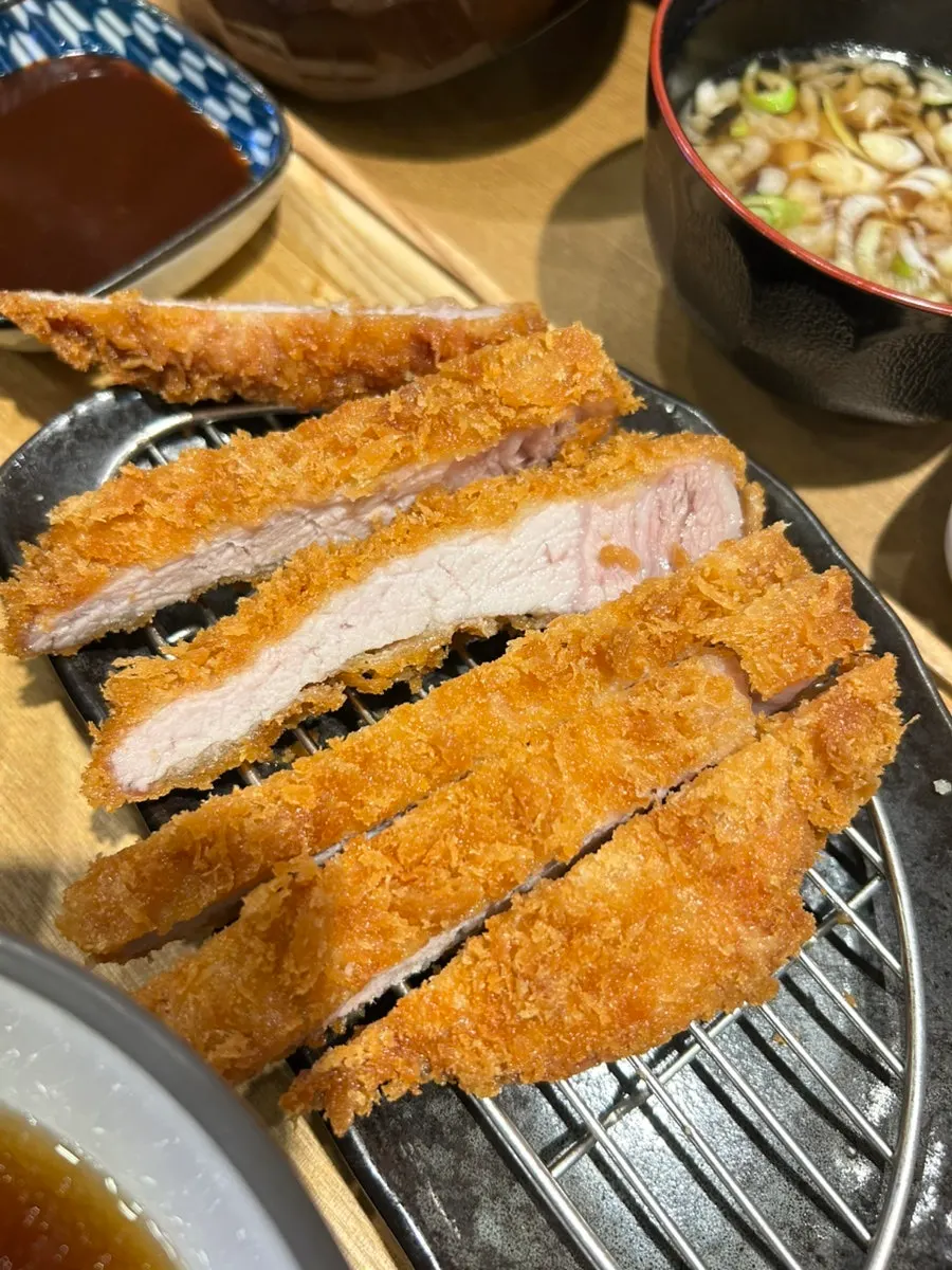 Cross-section of handmade Korean pork loin katsu