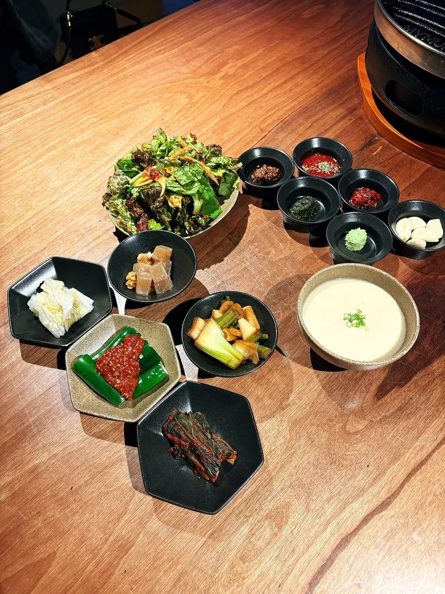 Table spread of homemade banchan and sauces