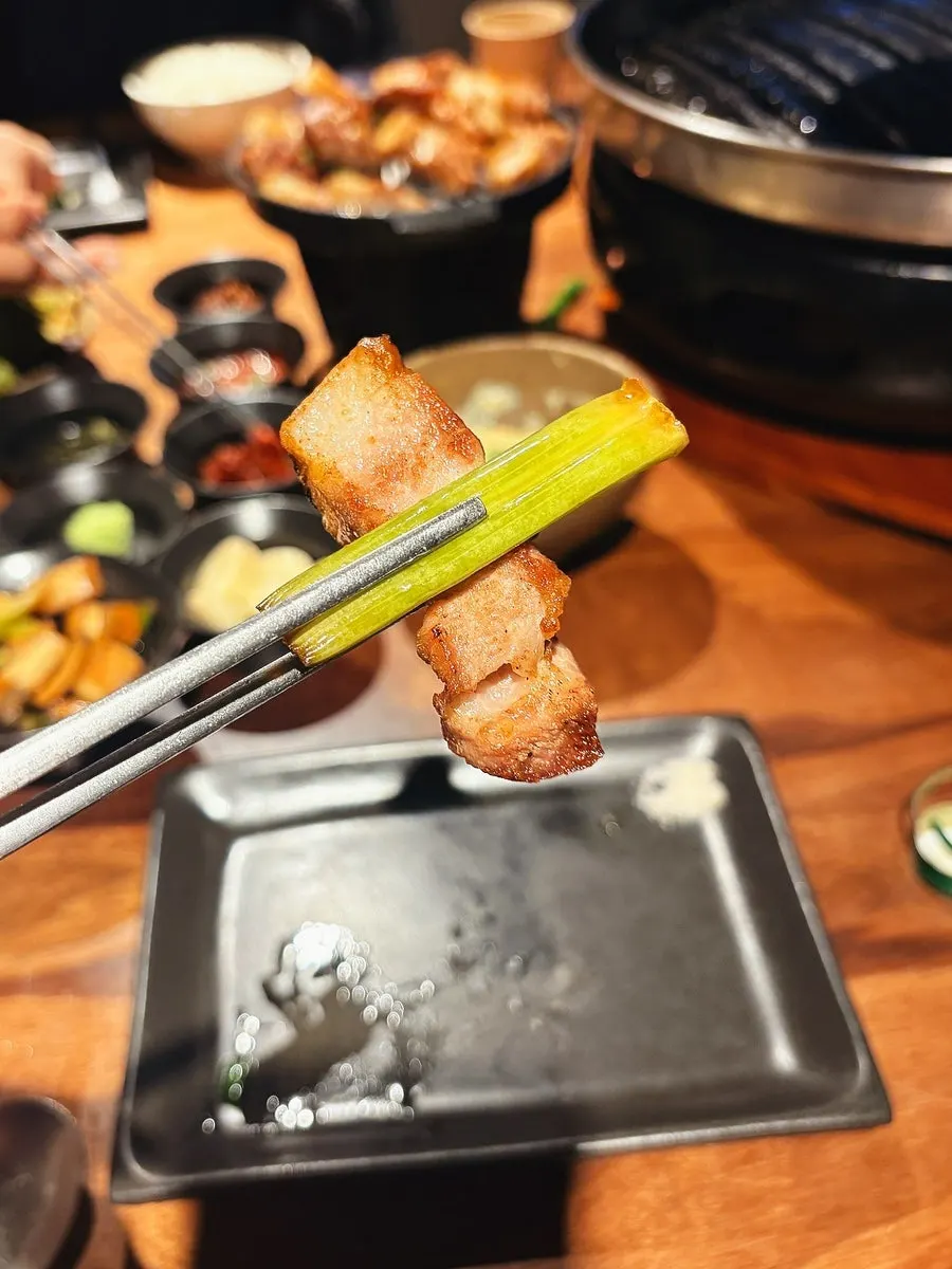 Thick-cut piece of meat dipped in handmade salt