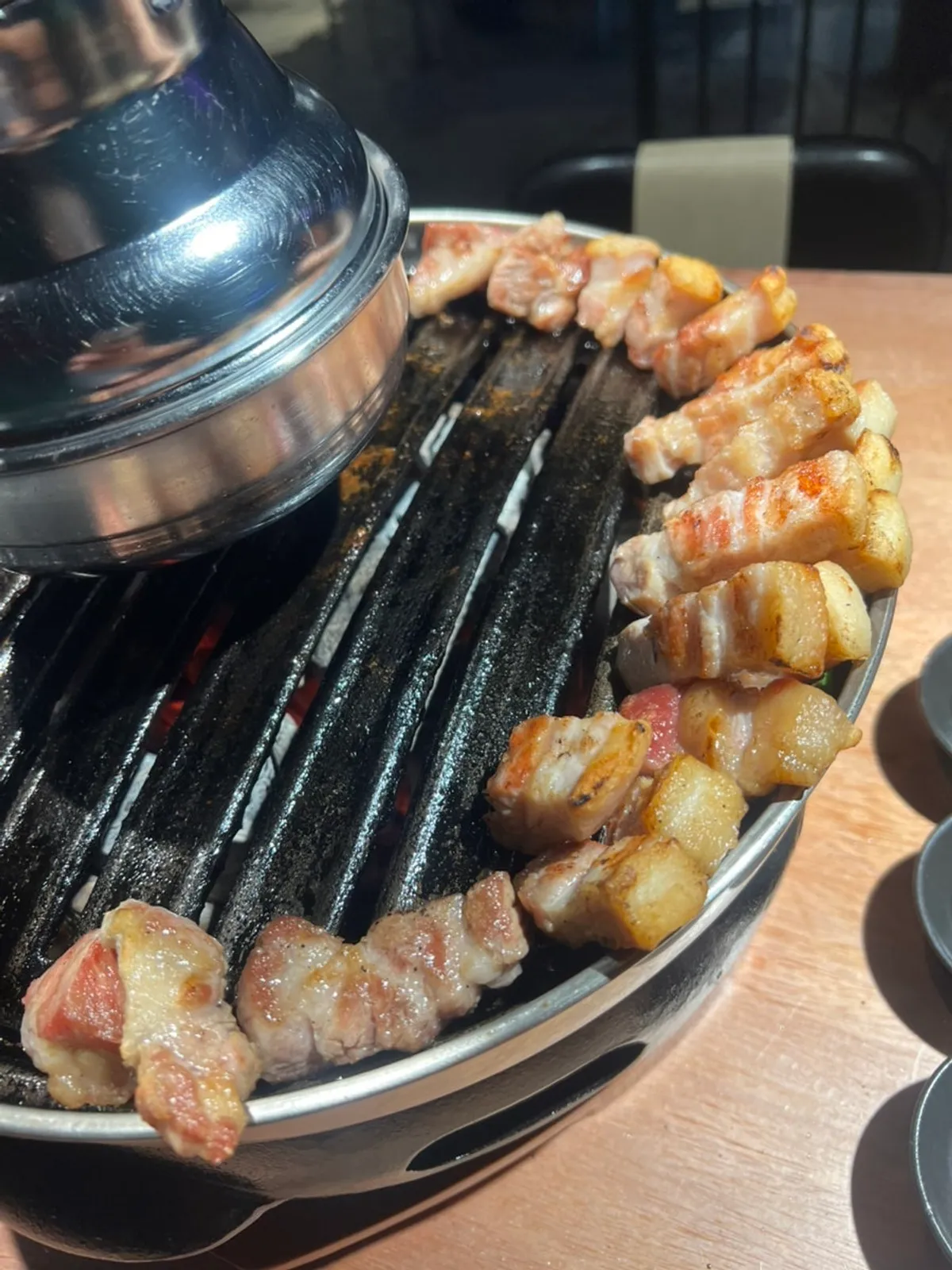 Samgyeopsal and mokssal grilled and arranged by staff