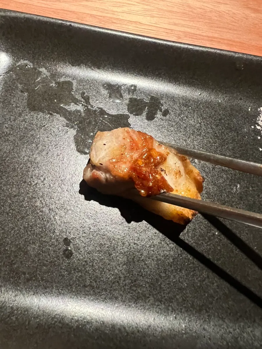 Meat dipped in myeoljeot with sansho pepper