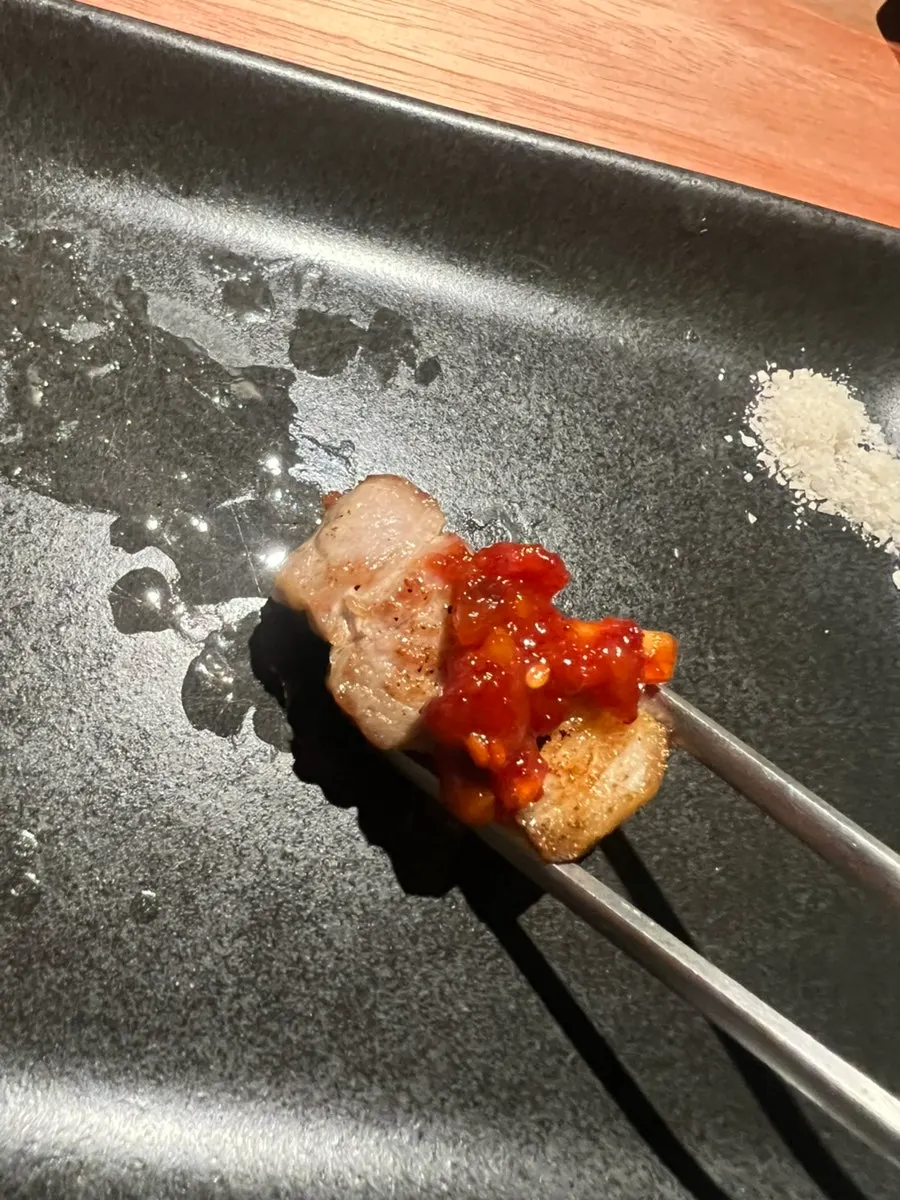 Grilled meat served with squid jeotgal