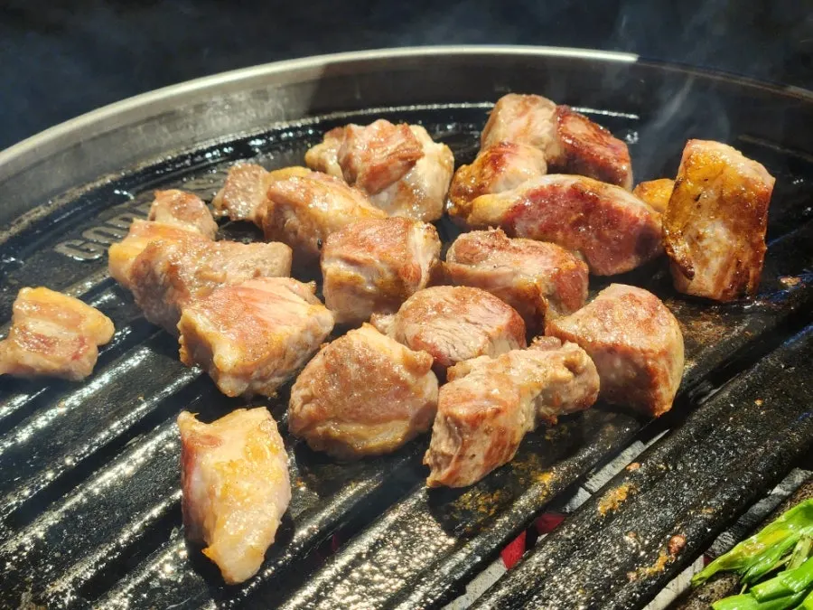 Pork cooking on the grill