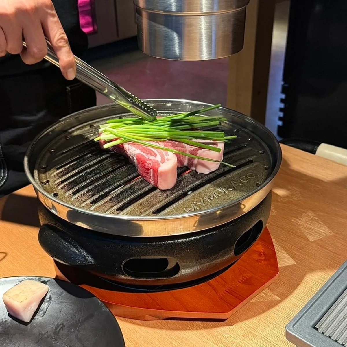 Pork belly and pork neck grilling on the pan