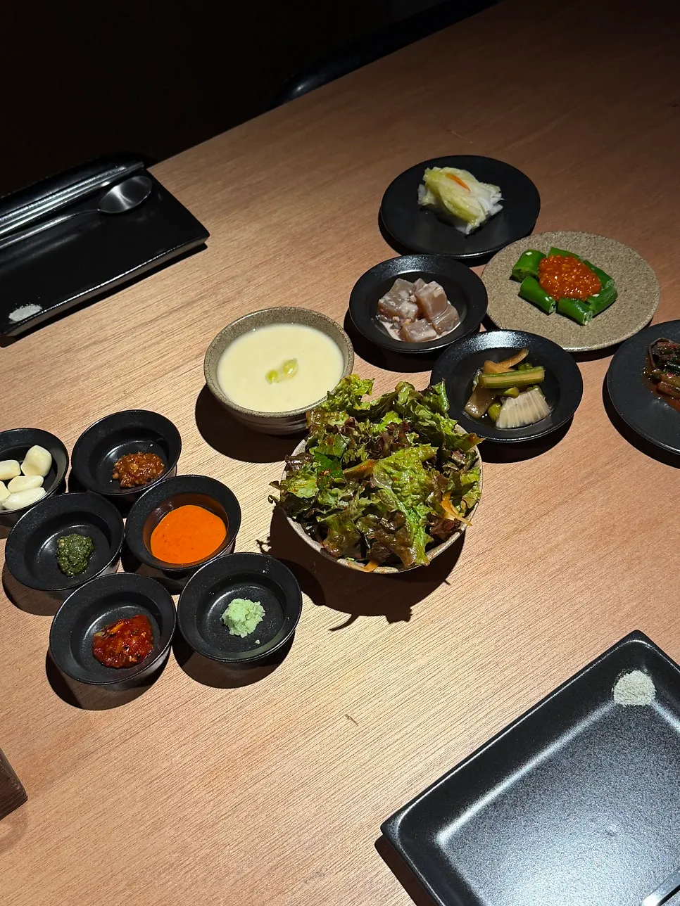 Table and seating interior at Godansu Gimhae Yulha