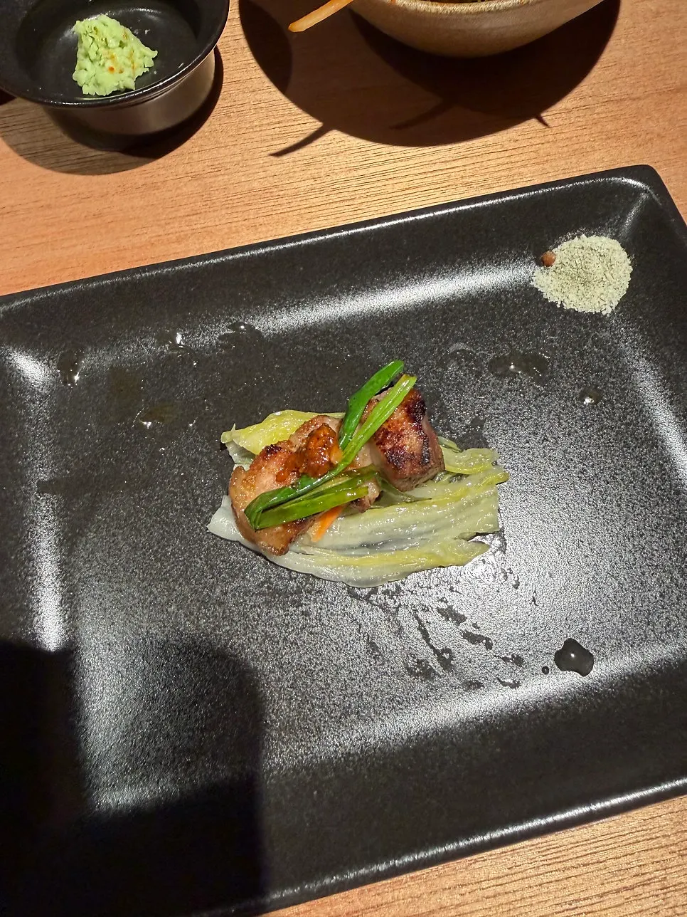 Golden, well-grilled pork belly on the brazier