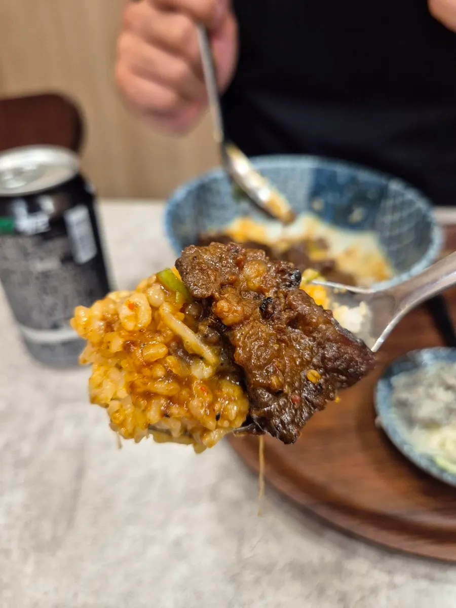 Rib rice bowl mixed with egg yolk