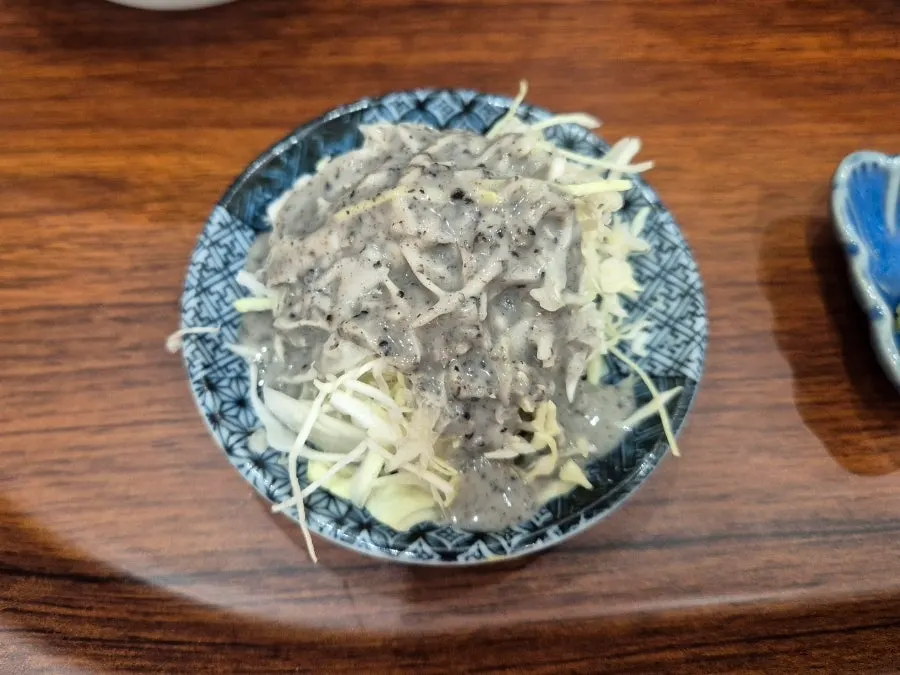 Salad with black sesame dressing