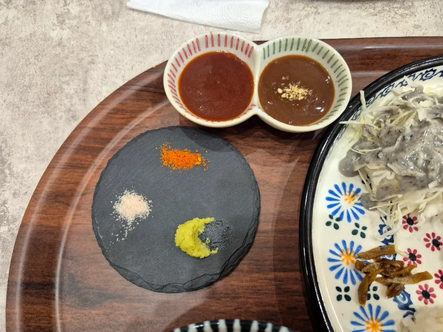 Two tonkatsu sauces and shichimi