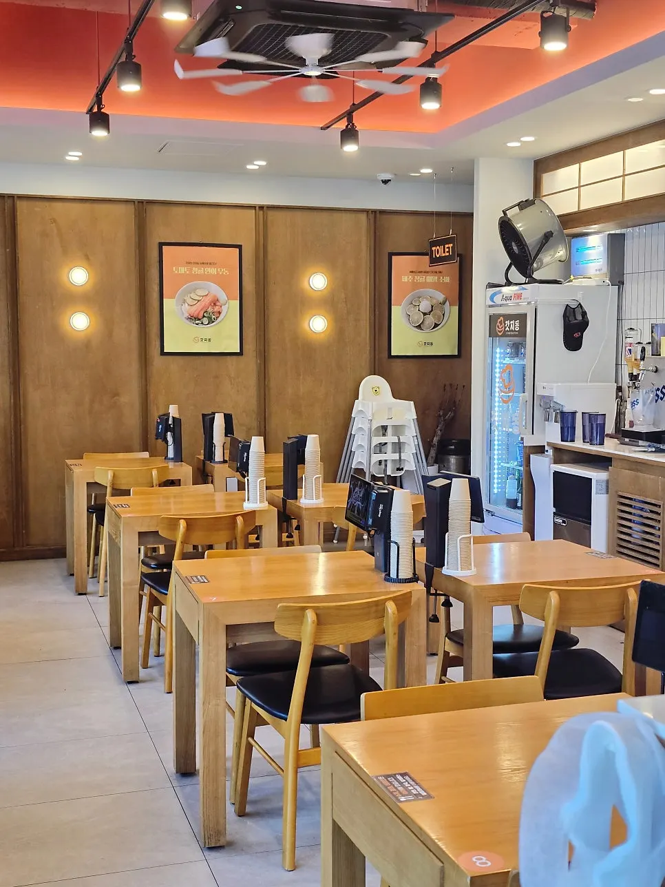 Counter-style solo seating and a baby chair