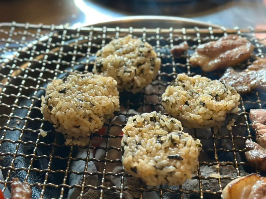 Rice ball grilling on the grill plate
